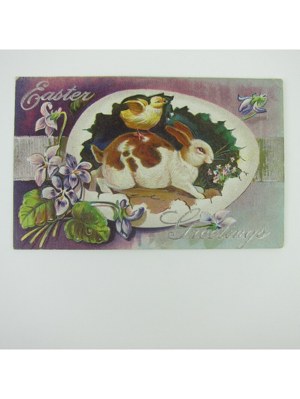 Easter Postcard Yellow Chick Rides on Rabbit of Back Purple Flowers Antique